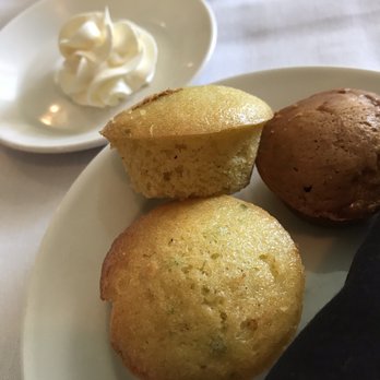 Ouisie's Table - Mini jalapeño and pumpkin cornbreads w/ whipped butter - New American Near Me - Houston, Texas