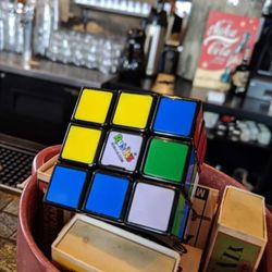 Pieces The St. Louis Board Game Bar & Cafe - Rubik's cube