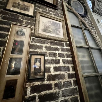 Muriel's Jackson Square - Old photos on wall - Cajun/Creole Near Me - New Orleans, Louisiana Muriel's Jackson Square - Old photos on wall - Cajun/Creole Near Me - New Orleans, Louisiana