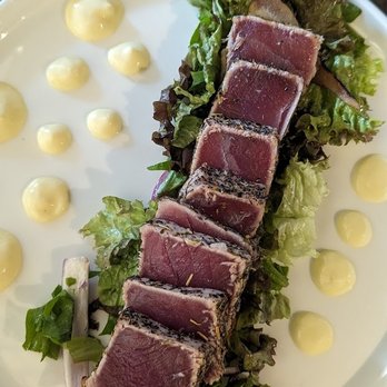 Vintage Year - The Yellowfin Tuna just melts in your mouth! Perfectly seared with an earthy herb crust. - Steakhouses Near Me - Montgomery, Alabama Vintage Year - The Yellowfin Tuna just melts in your mouth! Perfectly seared with an earthy herb crust. - Steakhouses Near Me - Montgomery, Alabama