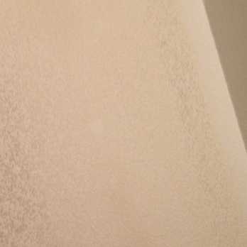 Acoustic Removed - Ceiling on left, wall on right, ceiling meets wall nicely, what I mean is it's right to the wall in a smooth (good) way - Drywall Installation & Repair Near Me - Ventura, California