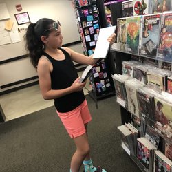 Books-A-Million - My daughter checking out the nice comic selection!!