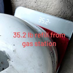 Los Gatos 76 - Our refill tank from 76 gas station weighed 35.2 lbs, which is about 6% more than the tank from a hardware store Blue Rhino exchange cage.