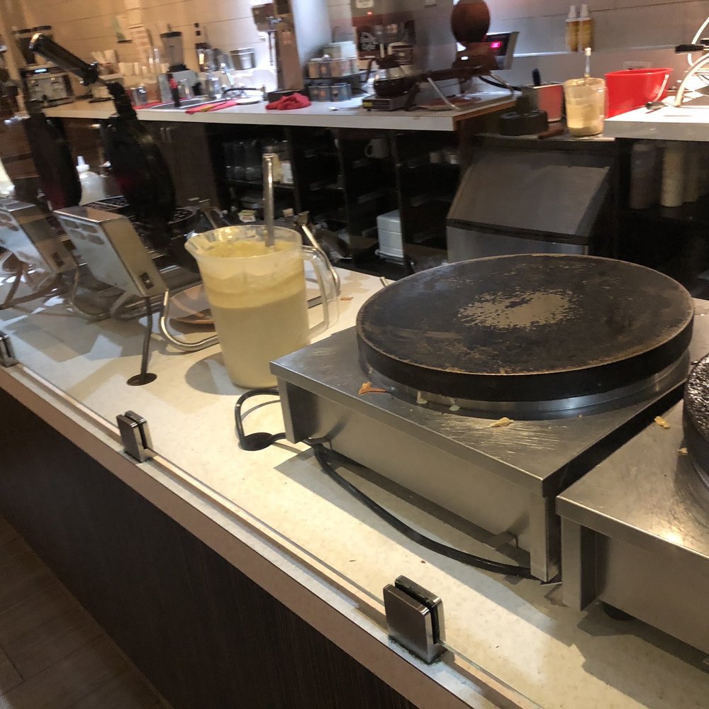 Demetres - a pan on a stove in a kitchen - Desserts Near Me - Etobicoke, Ontario Demetres - a pan on a stove in a kitchen - Desserts Near Me - Etobicoke, Ontario