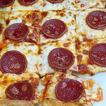Ledo Pizza - Pepperoni pizza and ranch dressing side (trying to hide) - Italian Near Me - Hampstead, Maryland Ledo Pizza - Pepperoni pizza and ranch dressing side (trying to hide) - Italian Near Me - Hampstead, Maryland