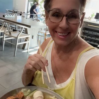 Tasty Pot - Julie A at Tasty Pot in Midtown with a sizzling and truly delicious Japanese Miso Hot Sizzling Soup. Julie A - Hot Pot Near Me - Reno, Nevada