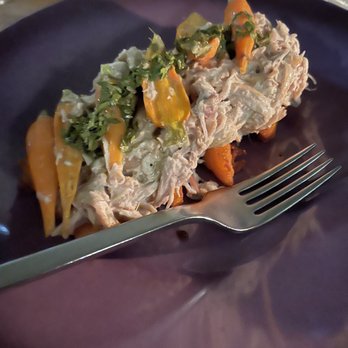 La Strega - Braised rabbit served over a crispy carrot polenta triangles - Italian Near Me - Las Vegas, Nevada La Strega - Braised rabbit served over a crispy carrot polenta triangles - Italian Near Me - Las Vegas, Nevada