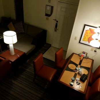 Residence Inn Phoenix - A very nice accommodating dining room compliments the living room with a fireplace. - Hotels Near Me - Phoenix, Arizona Residence Inn Phoenix - A very nice accommodating dining room compliments the living room with a fireplace. - Hotels Near Me - Phoenix, Arizona