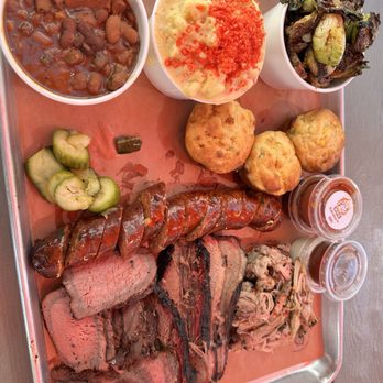 Wild Fig BBQ - Three meat and two sides. We added another side. This was about 65$ but it fed three of us and we still took home a whole to go box. - Barbeque Near Me - Las Vegas, Nevada Wild Fig BBQ - Three meat and two sides. We added another side. This was about 65$ but it fed three of us and we still took home a whole to go box. - Barbeque Near Me - Las Vegas, Nevada