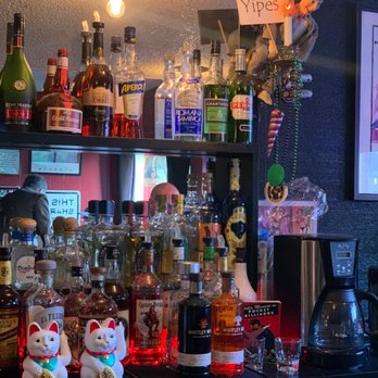 The Hearth - a bar filled with alcohol bottles - Bars Near Me - San Francisco, California The Hearth - a bar filled with alcohol bottles - Bars Near Me - San Francisco, California