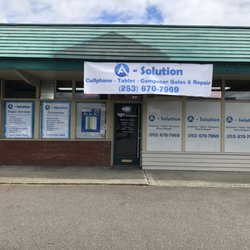 A Solution Repair Shop - Store front