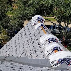 Slide of Axis Roofing