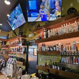 TVs right over the bar TVs right over the bar