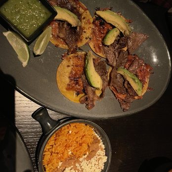 La Popular - The rib eye tacos and the rice and beans. The taquero down the street would be so insulted - Mexican Near Me - Porter Ranch, California