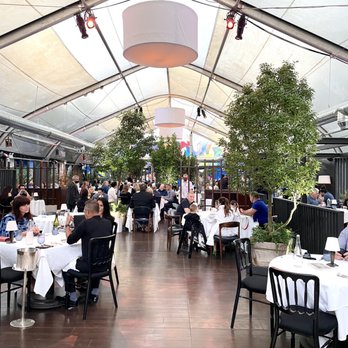 Spago - Tented outdoor seating area - New American Near Me - Beverly Hills, California Spago - Tented outdoor seating area - New American Near Me - Beverly Hills, California