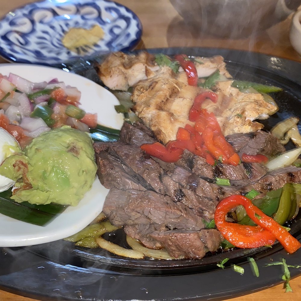 Cantina Laredo - Combo Fajitas of Grilled Chicken Fajita and Grilled Steak Fajita - Mexican Near Me - Jacksonville, Florida Cantina Laredo - Combo Fajitas of Grilled Chicken Fajita and Grilled Steak Fajita - Mexican Near Me - Jacksonville, Florida