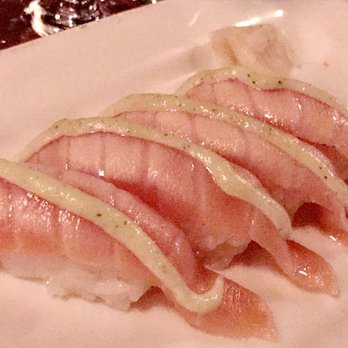 Umi Sake House - Seared Salmon Nigiri with Garlic Aioli - Sushi Bars Near Me - Seattle, Washington Umi Sake House - Seared Salmon Nigiri with Garlic Aioli - Sushi Bars Near Me - Seattle, Washington