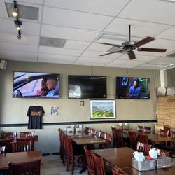 Slice of Martinez Pizza and Cheesesteaks - Inside dining.