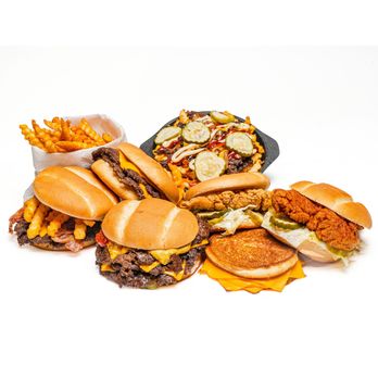 MrBeast Burger - a pile of burgers and fries - Food Delivery Services Near Me MrBeast Burger - a pile of burgers and fries - Food Delivery Services Near Me