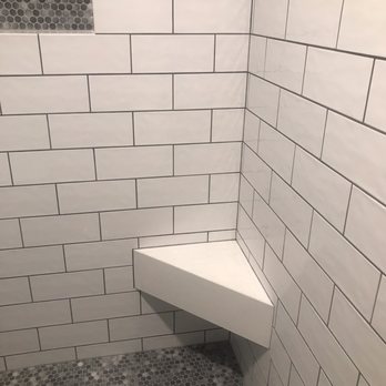 Remodeling Services Professionals - Niche and shower seat cut at 45 degrees for that clean look! These guys know all the tricks and have a keen eye for straight lines! - Handyman Near Me