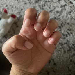 "White" gel polish that ended up being too translucent. I asked for 1 coat of a white to go on top, nail tech didn't want to fix it.