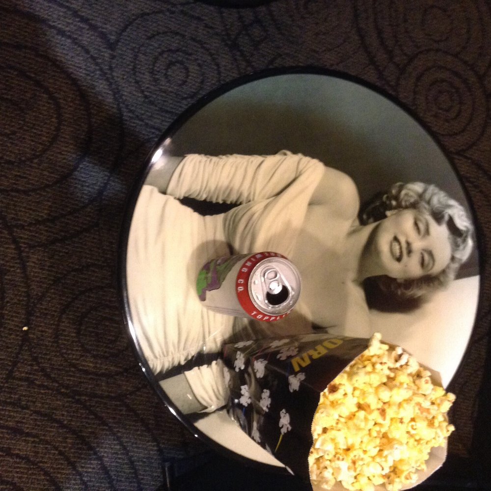 Fleur Cinema & Cafe - A table in the lobby. Plus popcorn and a beer - Cinema Near Me - Des Moines, Iowa