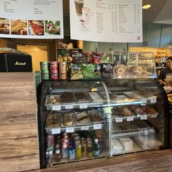 Counter and pastry case: Chips, bagels, pastries