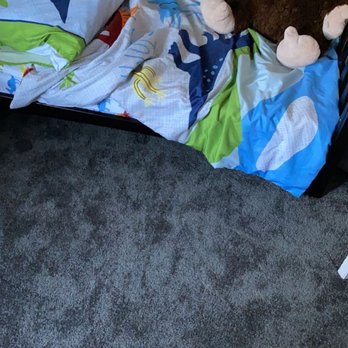 Jimenez Carpet and Flooring - a crib with a stuffed monkey - Carpeting Near Me Jimenez Carpet and Flooring - a crib with a stuffed monkey - Carpeting Near Me