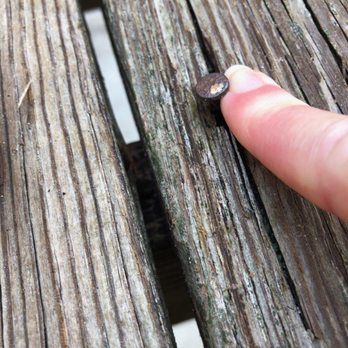 Beach Realty & Construction & Kitty Hawk Rentals - lifted nails riddled along the deck - General Contractors Near Me - Kitty Hawk, North Carolina
