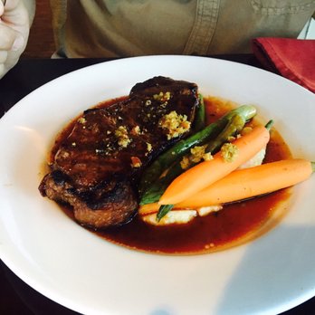 Travis Restaurant - Pepper crusted New York steak - New American Near Me - Austin, Texas