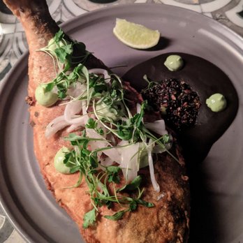 Margot - Crispy whole sea bream, salsa matcha, heirloom black beans and avocado mousse - Spanish Near Me - Culver City, California Margot - Crispy whole sea bream, salsa matcha, heirloom black beans and avocado mousse - Spanish Near Me - Culver City, California