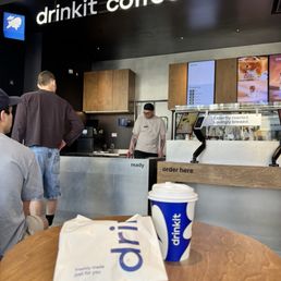 In the photo is my oat latte and a plain croissant In the photo is my oat latte and a plain croissant