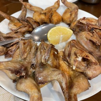 Emperor Palace Restaurant - a plate of chicken wings with a lemon wedge - Chinese Near Me - San Francisco, California Emperor Palace Restaurant - a plate of chicken wings with a lemon wedge - Chinese Near Me - San Francisco, California
