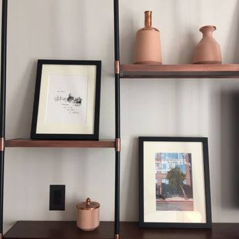 The Hoxton - Tastefully picked photos on an iron and wood frame wall shelf. - Hotels Near Me - Los Angeles, California The Hoxton - Tastefully picked photos on an iron and wood frame wall shelf. - Hotels Near Me - Los Angeles, California