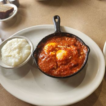 KupAJoe Cafe - Shashuka.. An African dish consisting of poached eggs in a tomato sauce and spices - Breakfast & Brunch Near Me - Frankfort, Illinois