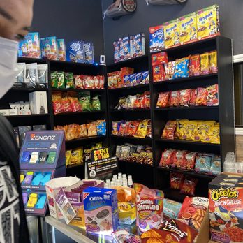 Exotics On Demand - a man wearing a face mask in a grocery store - Tobacco Shops Near Me - Bakersfield, California