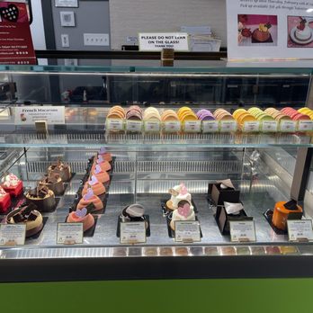 Norman Love Confections - a display case with a variety of desserts - Chocolatiers & Shops Near Me - University Park, Florida Norman Love Confections - a display case with a variety of desserts - Chocolatiers & Shops Near Me - University Park, Florida