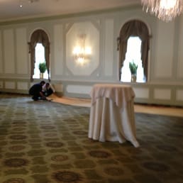 Sunday manager and staff pulling up the carpet and removing furniture in our event space in midst of event. Sunday manager and staff pulling up the carpet and removing furniture in our event space in midst of event.