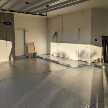 Ultimate Garage Finishes - a garage with a concrete floor - Flooring Near Me Ultimate Garage Finishes - a garage with a concrete floor - Flooring Near Me