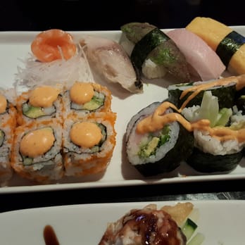Dozika - Spicy California maki and Bangkok maki. Salmon sashimi, mackerel nigiri, avocado nigiri, hamachi nigiri, and tamago nigiri - Japanese Near Me - Evanston, Illinois