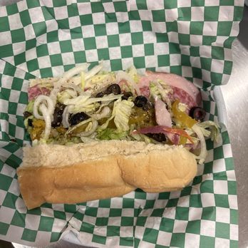 Jon Smith Subs - We split the Italian sub with bell peppers and olives, and we both were full. SO good. Customer service was amazing. - Delis Near Me - Houston, Texas