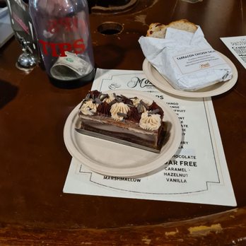 Mozart's Coffee Roasters - Chocolate cake and chicken tarragon salad sandwich - Coffee & Tea Near Me - Austin, Texas Mozart's Coffee Roasters - Chocolate cake and chicken tarragon salad sandwich - Coffee & Tea Near Me - Austin, Texas