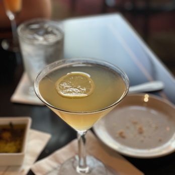 Grotto Ristorante - a drink in a martini glass - Italian Near Me - Galveston, Texas Grotto Ristorante - a drink in a martini glass - Italian Near Me - Galveston, Texas