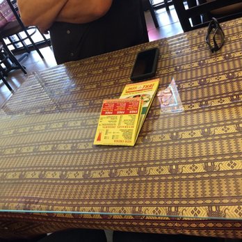 Basil Thai Cooking - As you guy can see there were not even a glass of water was serve on the table it's empty only my co-workers cell phone - Thai Near Me - Arcadia, California