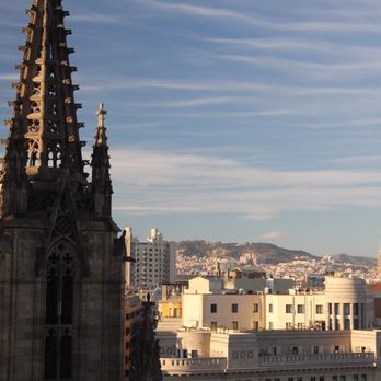 Catedral de Barcelona - Rooftop. Sagrada Familia is in the distance - Landmarks & Historical Buildings Near Me - Barcelona, B Catedral de Barcelona - Rooftop. Sagrada Familia is in the distance - Landmarks & Historical Buildings Near Me - Barcelona, B
