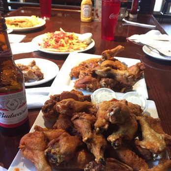 On the Half Shell - 50 wings & bacon cheese fries - Bars Near Me - Murrells Inlet, South Carolina