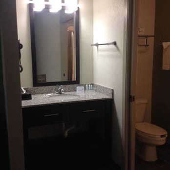 Sleep Inn - Modern sink area. You can barely see it but this room has only a shower but it's a nice spacey clean shower - Hotels Near Me - Flagstaff, Arizona