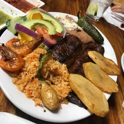 Puerto Escondido - Carne asada plate with our two left over cucaracha shrimps...lol