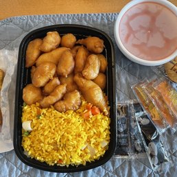 a tray of food and a cup of coffee a tray of food and a cup of coffee