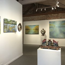 Arts On Douglas - Gallery View, featuring ceramics by Trent Berning and paintings by Robert Ross (left), and BJ Lantz (back wall)